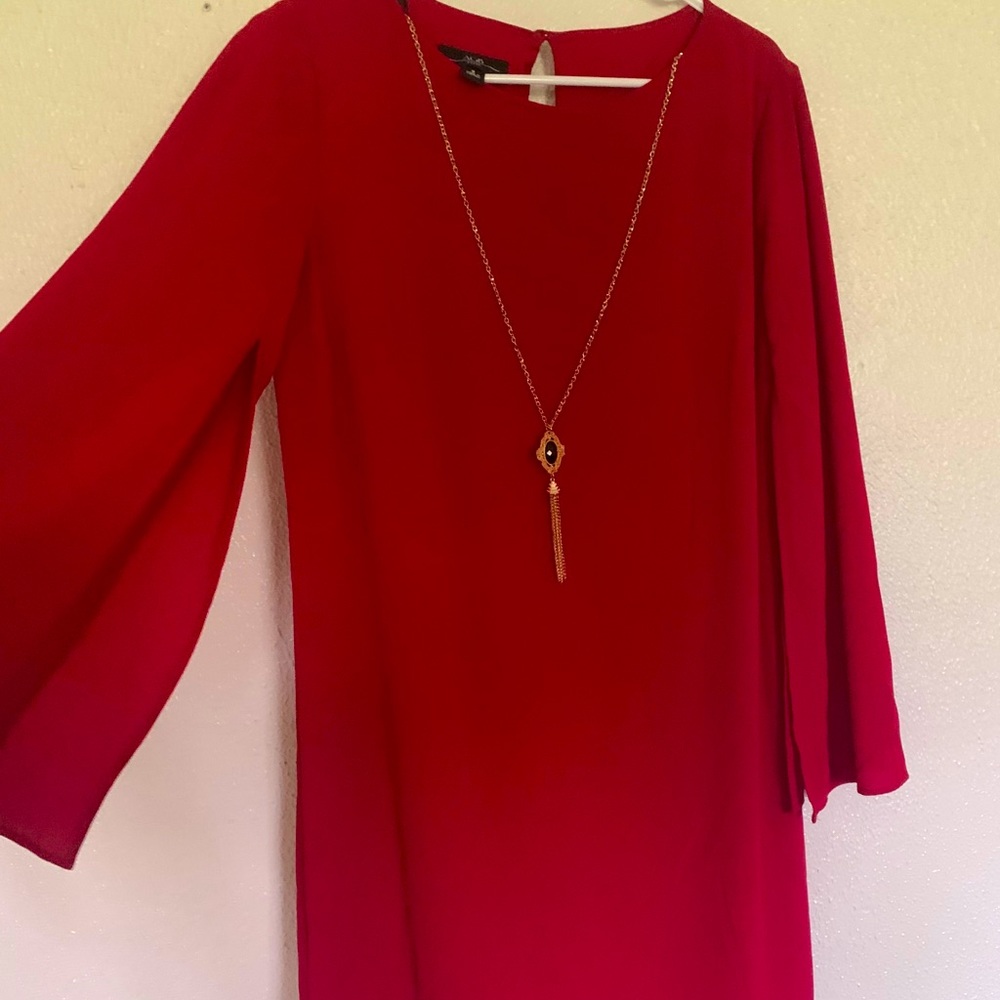Red sleek dress with necklace